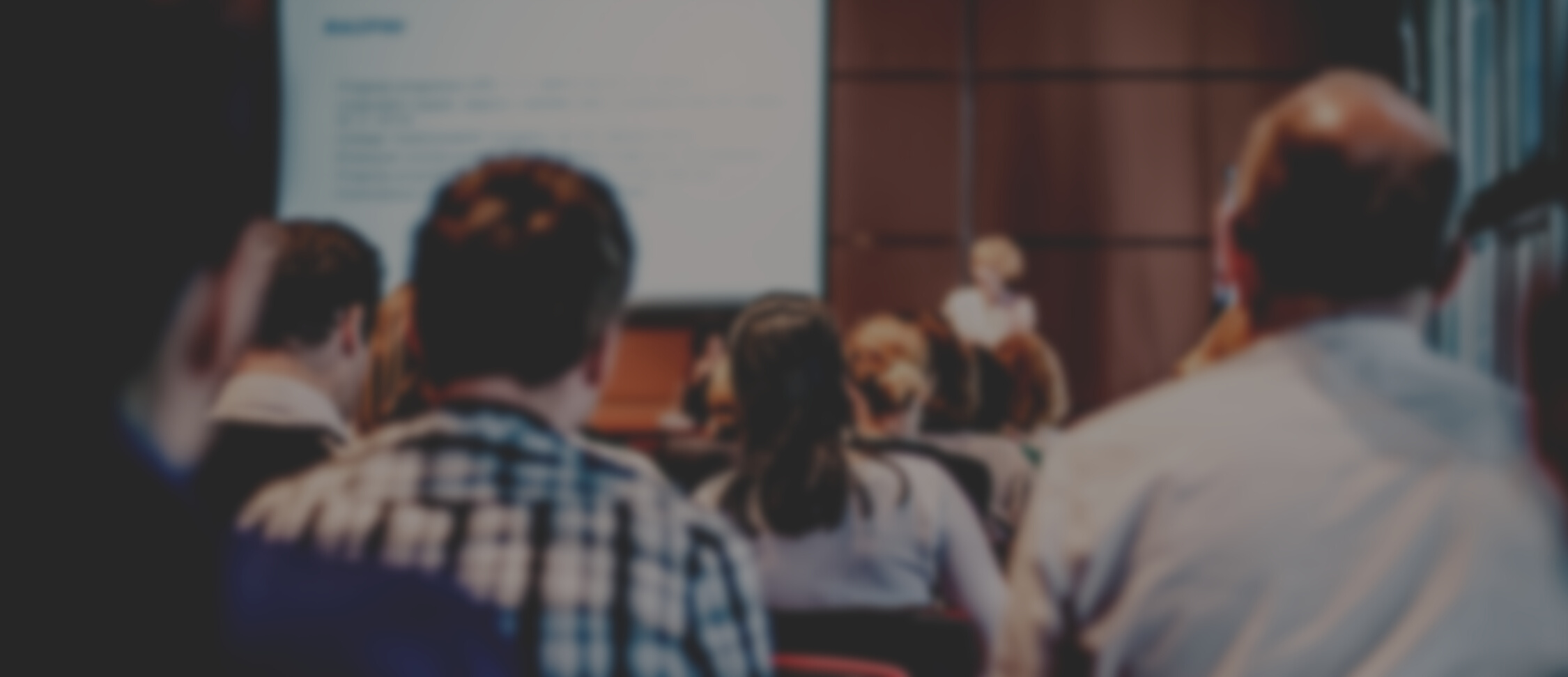 Business Speaker Giving a Talk at Business Conference 